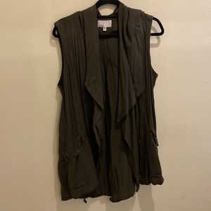Asymmetrical utility vest with hood